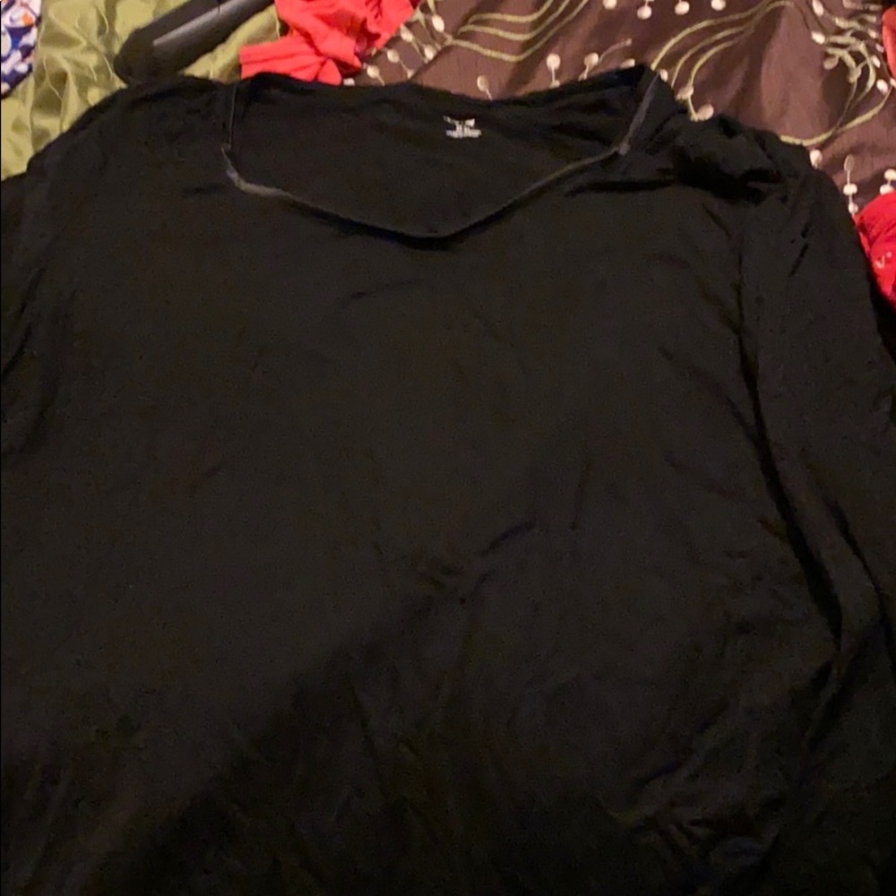 6 plus size T-shirts. Some long some short.